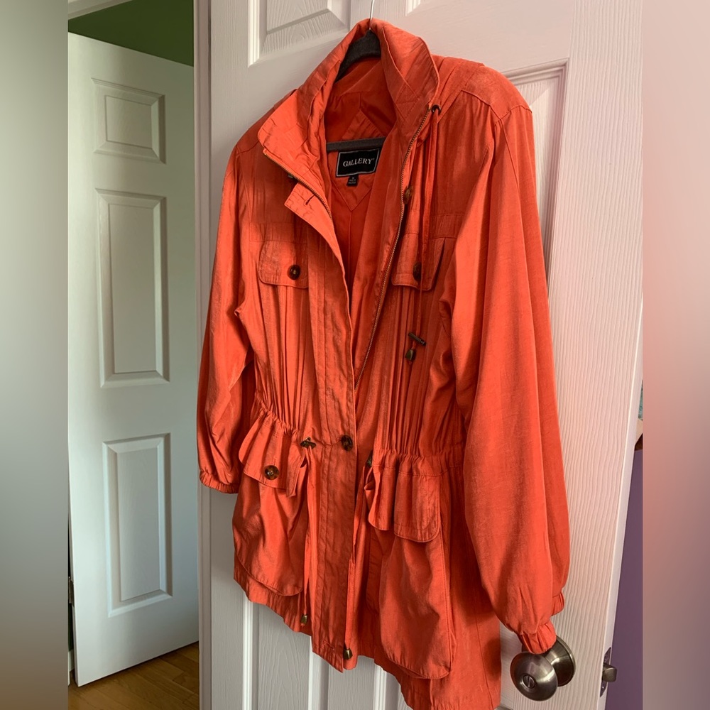 M Gallery salmon colored windbreaker
